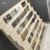 Sala de transmisión en vivo de comercio electrónico Soporte escalonado Estante de exhibición de varias capas para joyería Esmalte de uñas Aceite esencial Estante de almacenamiento para encendedores Thangka