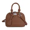 Bolso de concha de mano informal con textura para mujer 2025 Verano Nuevo Estilo Moda Diaria Ropa de Trabajo Bolso Bandolera