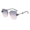 Gafas de Sol de Marco Grande Coloridas Estilo Nuevo Sin Marco Bordes Cortados Cadena Transfronterizas Moda Europea y Americana Versátiles para Mujer