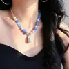 Collar de cadena para clavícula de alta calidad con diseño de perla de agua dulce barroca natural, cristal blanco y aguamarina artificial