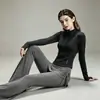 Conjunto de atuendo de yoga para mujer con un toque de alta gama, que incluye un cárdigan con cuello alto, mangas largas, pantalones de yoga de cintura alta y ropa elástica y transpirable para correr y fitness para mujer.