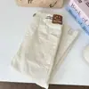 Pantalones blancos para niña, estilo coreano, nuevo modelo primavera y otoño 2026, corte ajustado, elegantes, con aberturas laterales, pantalones pitillo versátiles y a la moda para bebés