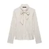 Falda corta de nueve puntos y camisa a rayas para mujer, estilo europeo y americano transfronterizo, nueva, moderna y elegante, 2026, con detalle de lazo 4387260
