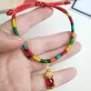 Festival del Bote del Dragón pulsera de cuerda colorida cuerda roja venta al por mayor tejido a mano cuerda roja de mano tamales cadena de mano pequeño regalo para niños venta caliente
