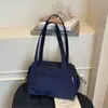 Bolso de mano coreano de nicho para el trabajo, bolsa de nailon, bolsa deportiva casual pequeña para el gimnasio, bolso de hombro único versátil