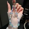 Muñeca Linda de Dibujos Animados Cadena Hecha a Mano Cordón Colgante Adorno Colgante Cordón para Teléfono Bolso con Cuentas para Cámara Colgante para Teléfono