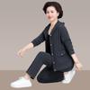 Traje Deportivo para Mujer, Nuevo Estilo Primavera y Otoño 2026, Moderno y Juvenil, Conjunto de Dos Piezas Casual Holgado con Pantalones de Pierna Recta, Atuendo para Mamá que Reduce la Edad