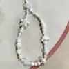 Jingdezhen Cerámica Dulce Estrella de Mar Vieira Moda Cadena para Teléfono Móvil Cuerda Colgante para Bolso de Cámara Nuevo para Mujer Venta al por Mayor