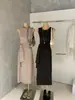 Wgwe8790 Vestido de punto sin mangas para mujer Guangzhou Shisanxing Primavera/Verano Nuevo con Cinturón de Corbata y Falda Larga Bodycon