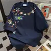 Camiseta de Algodão Pesado de Manga Curta Estilo Casal Ins Verão Casual Tendência Marca Desenho Animado Impresso Tops Soltos para Homens e Mulheres