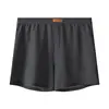 Ropa interior de hombre Huajielong de malla de seda helada, color liso, al por mayor, de cintura media, talla grande, transpirable, calzoncillos tipo bóxer para hombre, disponible para dropshipping