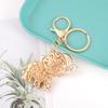 LLavero de elefante de cristal con incrustaciones de diamantes, bonito y creativo, llavero de animal, bolso, accesorios, colgante de metal, regalo al por mayor