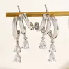 Pendientes de borlas irregulares de moda con incrustaciones de circonita para mujer, de venta caliente transfronteriza europea y americana, con pendientes de remaches apilados para mujer
