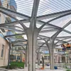 Fabricante del Pabellón de Metal de Shanghái proporciona construcción a medida de pabellones con forma de arco de placa única de aluminio de doble curvatura para paisajismo de jardines