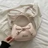 Moda Estrela do Comércio Exterior bolsa feminina 2026 nova laço moderna estilo coreano chique bolsa de ombro transversal para mulheres