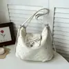 Mochila casual de grande capacidade para mulheres, novo modelo 2026, bolsa de ombro para o dia a dia com estampa de estrelas, bolsa transversal moderna e simples