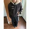 Abrigo de Algodón de Invierno para Hombre con Botonadura Diagonal, Cuello de Piel Estilo Americano, Botones de Cuerno, Capucha y un Acabado de Alta Gama