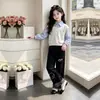 2026 Novo Conjunto de Duas Peças para Primavera e Outono Estilo Universitário Moletom de Manga Longa Calça Longa de Perna Larga Casual Solta Xadrez