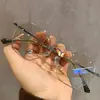 Lentes para miopía caja pequeña estudiantes universitarios cara pequeña espejo pequeño para miopía artefacto de maquillaje luz anti-azul espejo plano femenino