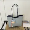 Bolso casual de gran capacidad para mujer 2026 verano nuevo bolso versátil para mujer bolso de hombro para ir al trabajo bolso de mano de moda bolso tote