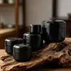 Pote redondo de plástico PP com dupla camada preta, disponível em vários tamanhos, portátil para armazenar e dispensar frascos vazios de creme facial, creme para os olhos e produtos de skincare