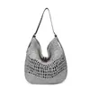 Bolso tejido de paja ahuecado para mujer, nuevo modelo 2026, bolso tejido de playa de gran capacidad, estilo casual y relajado, bolso tote de moda