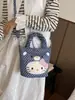 Bolso de mano Hello Kitty para mujer 2026 nuevo bolso tipo cubo de dibujos animados con un toque de alta gama, adecuado para ir al trabajo, bolso de hombro y cruzado de lunares