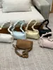 Bolso de Mano Pequeño de Alta Gama Transfronterizo para Mujer, Nuevo Bolso Versátil de Hombro o Axila Primavera 2026, Popular Bolso Tote Cruzado