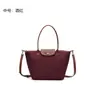 Bolsa popular de 2026, bolsa de bolinho moderna e simples, bolsa versátil Longchamp para ombro e transversal, fabricante de bolsa tote de tamanho médio