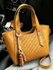 Bolso de Hombro Vintage Nuevo Otoño 2026 Transfronterizo, Bolso Cruzado Versátil Casual para el Trabajo, Bolso Cubo de Moda con Patrón Tejido