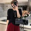Suéter de Punto Suave Color Sólido Hueco Botón Lateral Cuello Redondo Estilo Coreano para Mujer, Nuevo Casual Holgado Manga Larga Otoño 2026