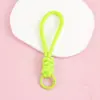 Llavero cordón de cuerda trenzada de nailon para hombres y mujeres hebilla de montañismo cuerda de mano para parejas colgante de bolsa teléfono llave lazo