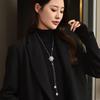 Directo de fábrica otoño e invierno cadena de suéter de copo de nieve borla giratoria copo de nieve collar largo elegante traje de temperamento femenino broche