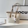 Bolsa Casual Simples de Grande Capacidade Estilo Coreano para Mulheres Moda Primavera/Verão 2026 Bolsa Tote Versátil para Trabalho e Deslocamento Bolsa de Ombro