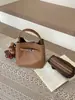 Bolso Kelly de Nicho Coreano Bolso de Mujer 2025 Nuevo de Moda Retro Bolso Cubo Bolso de Hombro Cruzado Simple