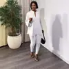 Moda Tricô Europeia e Americana Feminina 2026 Novo Conjunto de Duas Peças Elegante com Top de Gola V Dividido em Cor Sólida e Multicolorido e Leggings