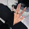 Anillo Abierto Hecho a Mano de Cuadros Blanco y Negro de Moda Sencillo con Goteo de Aceite Anillo Distintivo para Estudiantes Femeninas Geométrico Nuevo Producto Nicho