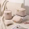 2026 Nuevo Modelo Venta Cruzada Dropshipping Set de 4 Bolsas de Maquillaje de Pana Gran Capacidad Botón Bolsa de Maquillaje