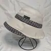 Sombrero de pescador a cuadros estilo coreano para otoño e invierno, con un diseño pastoral estilo ins, casual y moderno, hace que la cara se vea más pequeña y proporciona calor - un elegante sombrero de pescador