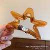 Primavera Verano Nuevo Estilo Coreano 2026 Color Caramelo Acetato Pinza de Garra Estrella Pinza de Tiburón de Gama Alta Pinza para el Cabello Accesorios para el Cabello Mujeres