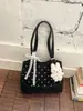 Bolso de axila grande de estilo coreano transfronterizo para mujer, nuevo modelo primavera 2026, bolso de hombro estampado simple, bolso tote para el trabajo