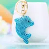Lindo llavero de coche de delfín con adornos completos de pedrería, un colgante 3D creativo, perfecto como regalo para bolsos de mujer o llaveros