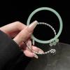 Nova Pulseira Estilo Chinês Estilo Antigo Pulseira Feminina Luxo Leve Design de Nicho Pulseira de Jade Sintético Pulseira Enrolada com Borla