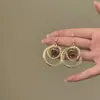Aretes de aro estilo vintage con piedra de ojo de tigre dorada, únicos y hermosos, que exudan un encanto sofisticado y elegante, perfectos para mujeres