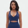 Sujetador cruzado de punto liso sin costuras de estilo europeo y americano, top ajustado, ropa deportiva de yoga con absorción de humedad y moldeadora.