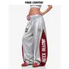 Pantalones de chándal brillantes de estilo americano con bloques de color y estampado de letras de alta costura, pantalones casuales holgados y fluidos de pierna ancha para mujer