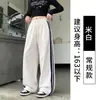 Calça listrada estilo americano de perna larga para mulheres, nova calça casual versátil de cintura alta para primavera e outono com caimento fluido e corte solto, calça esportiva de perna curva
