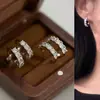 Pendientes Curvos de Zirconia Exquisitos de Alta Gama para Mujer, Pendientes Versátiles de Moda Trendy para el Viaje Diario, Pendientes de Disco de Bobina de Mosquitos