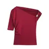 Atacado de Roupas Femininas Prontas de Fábrica para Exportação 2025 Novo Top Camiseta Assimétrico com Pregas Metálicas e Ombro Inclinado na Cintura