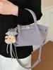Bolsa balde tendência de nicho para carregar na mão, nova moda primavera 2026 bolsa de ombro estilo coreano, bolsa transversal de alto valor para mulheres